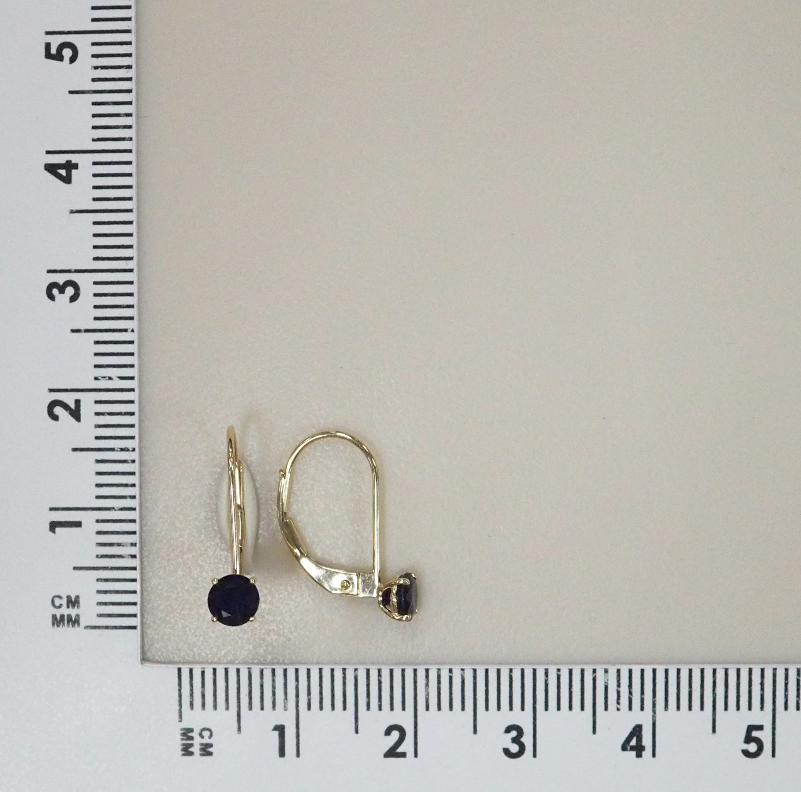 Серьги из желтого золота с сапфирами